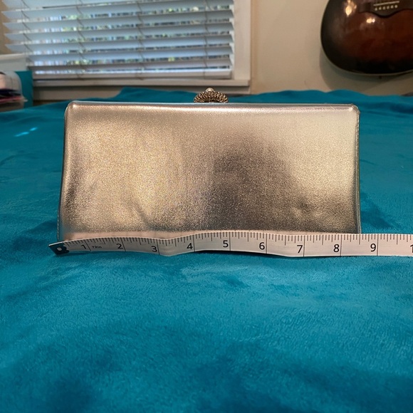 Chic Black Wristlet with Sleek Design and Metallic Accents - Picture 14 of 16